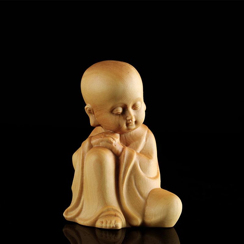 Wooden monk statue