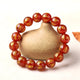 Bracelet mala en pierre d'agate rouge motif om mani padme hum Bracelets Malas Artisan d'Asie